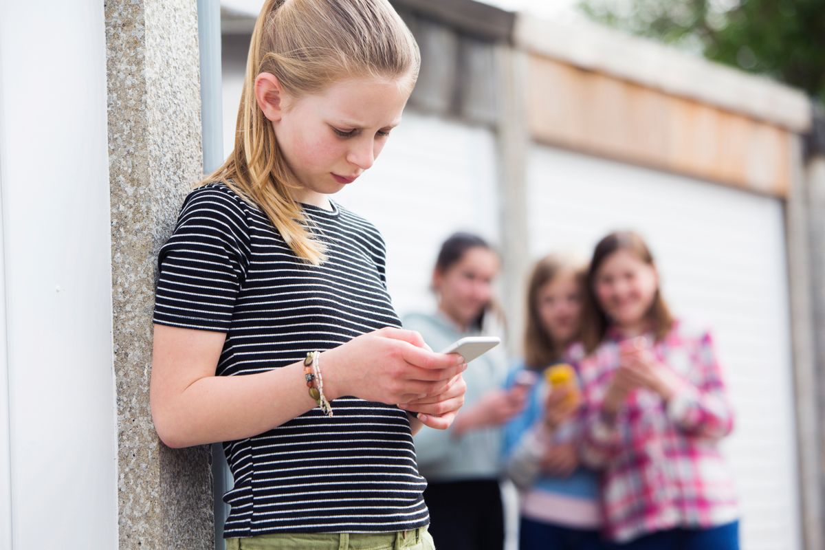 Pre,Teen,Girl,Being,Bullied,By,Text,Message